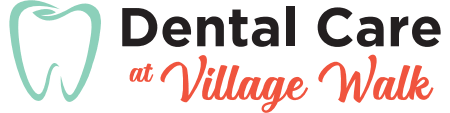 Dental Care At Village Walk Logo - Black sans-serif type and orange script type with light green tooth icon to left