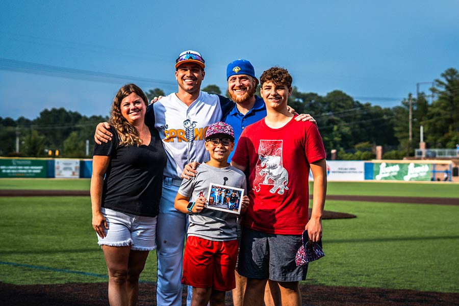 Photo of Holly Springs Salamanders player with host family