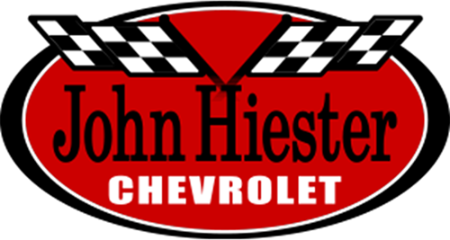 John Hiester Cheverolet Logo - Black serif type with white sans-serif type and checkered flags inside red and black oval