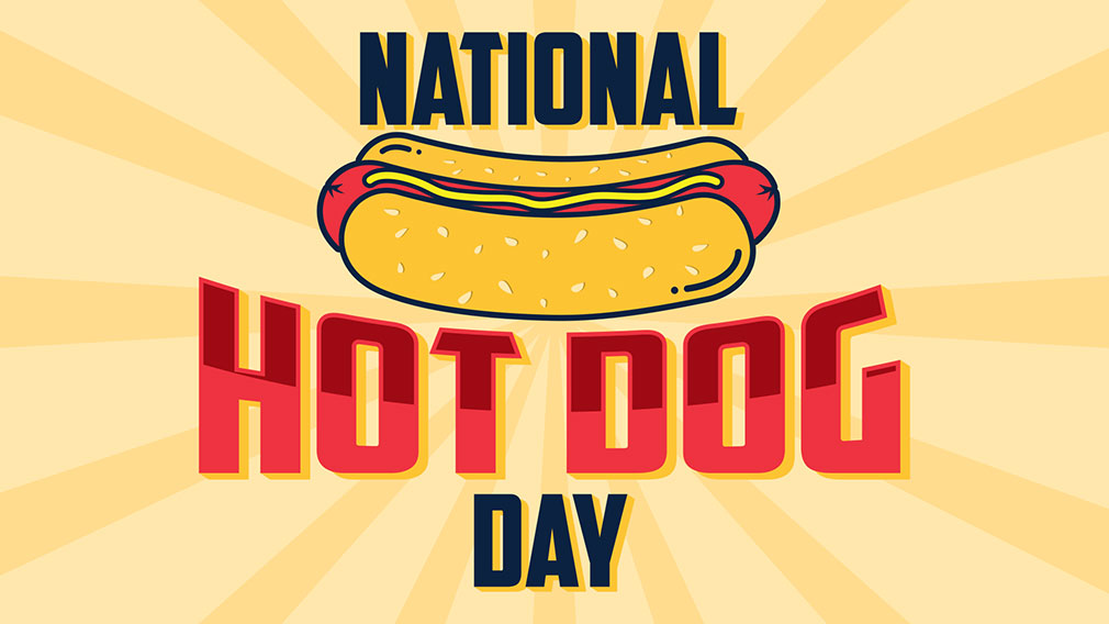Graphic showing illustration of hot dog with dark blue and red serif type over yellow sun burst background