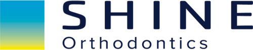 Shine Orthodontics Logo - Dark blue sans-serif type with blue to yellow gradient square to left